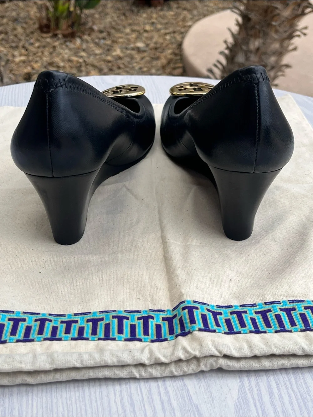 Tory Burch Sally Black Leather Wedge Pumps with Gold Medallion